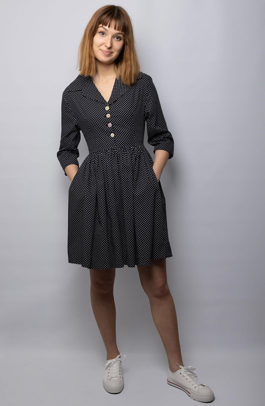 The Lily Dress is perfect for 1950s chic style. This Black tea dress is made with a vintage-inspired silhouette and is crafted from a comfortable lightweight fabric. Enjoy the perfect fit and timeless style of this comfortable dress., cotton dress
