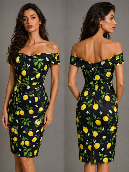 Woman wearing a black dress with lemon pattern, shown from front and back.