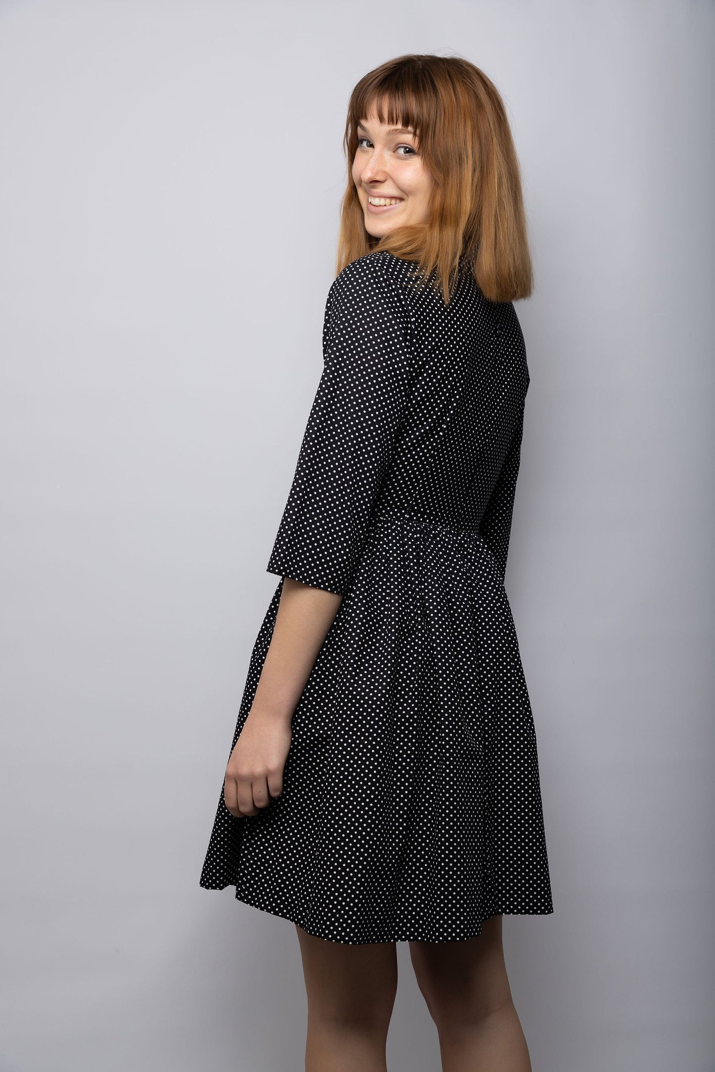 The Lily Dress is perfect for 1950s chic style. This Black tea dress is made with a vintage-inspired silhouette and is crafted from a comfortable lightweight fabric. Enjoy the perfect fit and timeless style of this comfortable dress., cotton dress